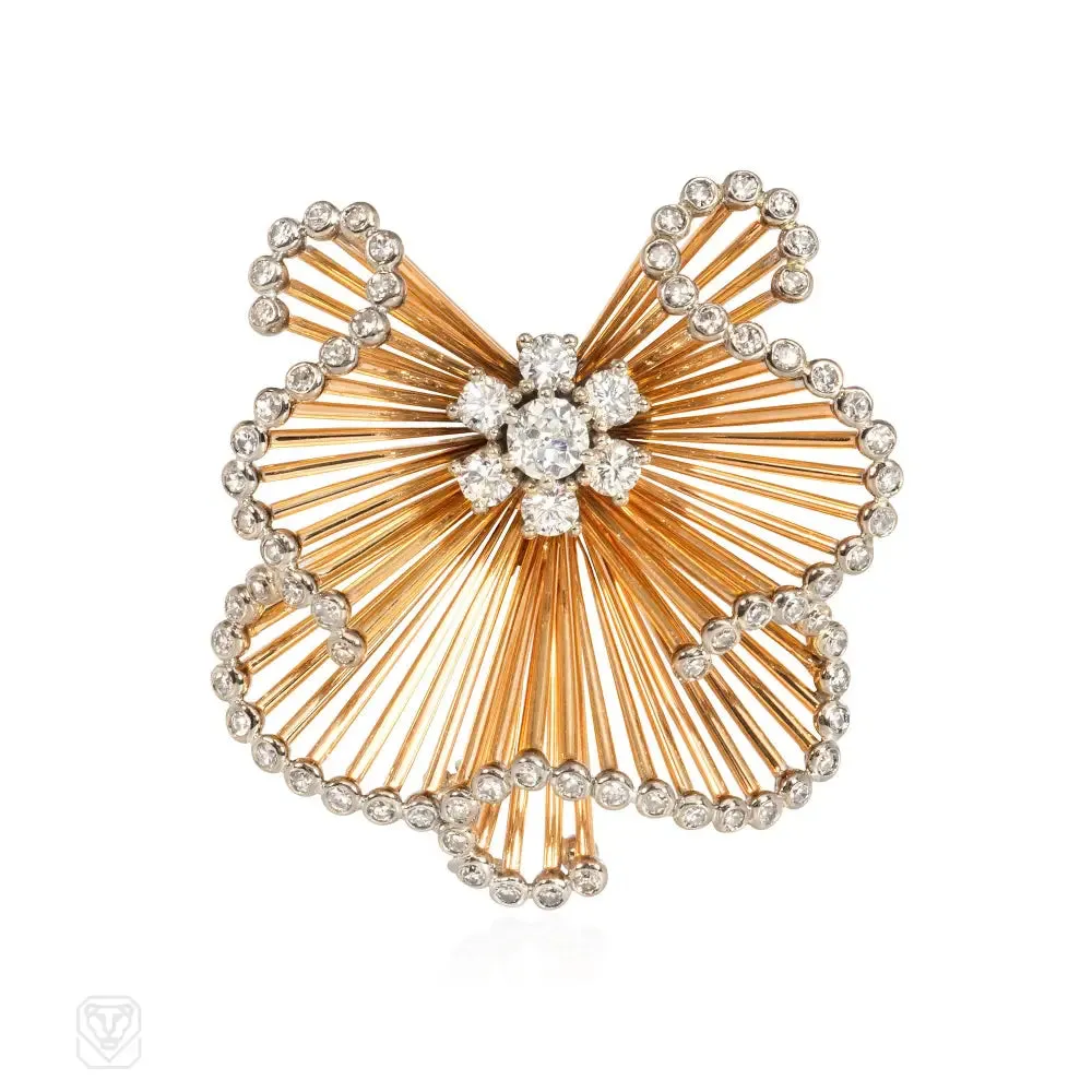 1950s Tiffany gold and diamond scroll brooch