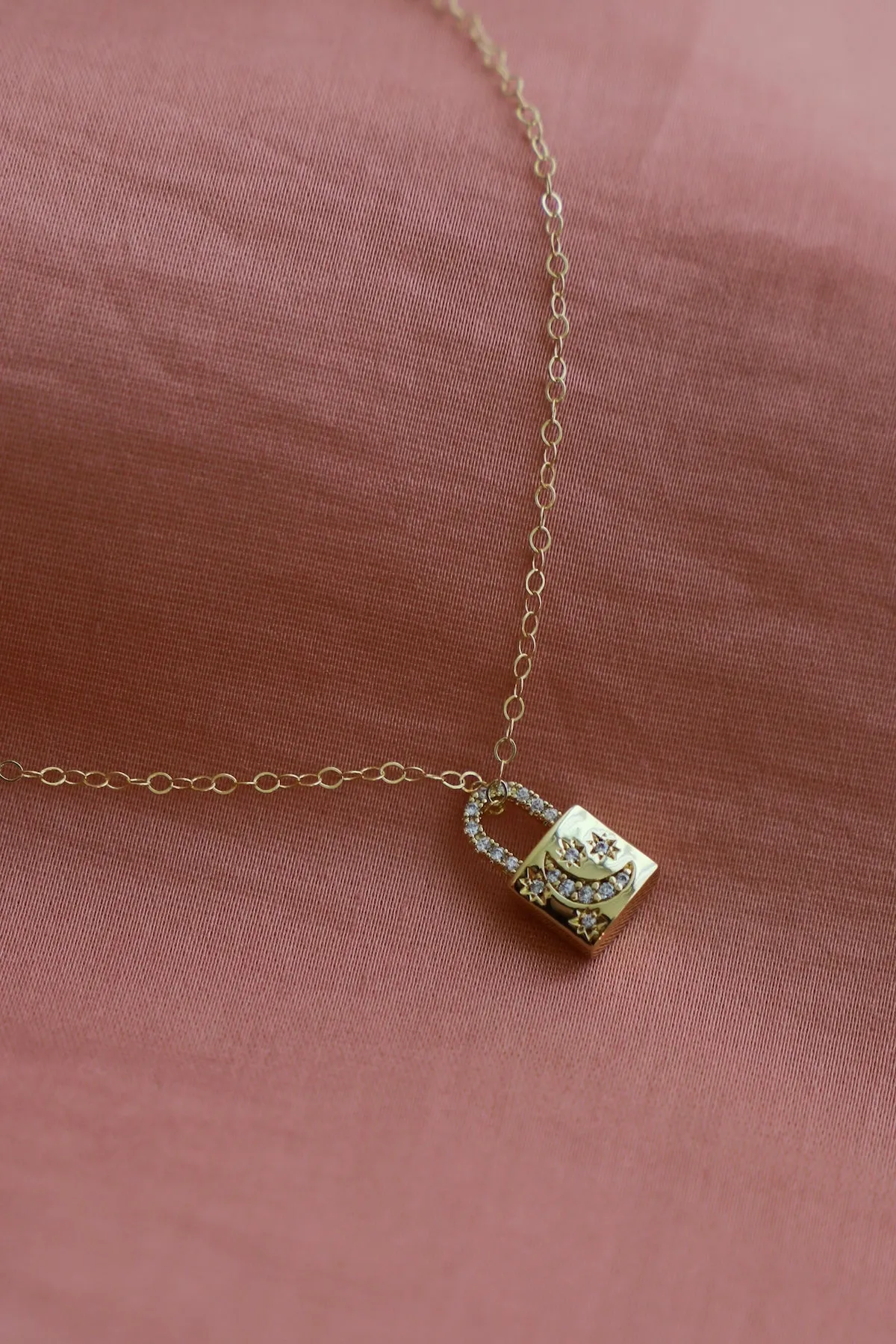 CELESTIAL LOCK CHARM NECKLACE