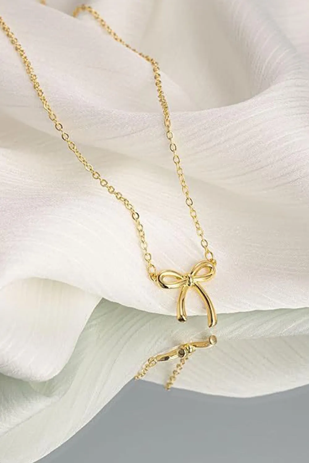 Gold Bow Pendant Necklace