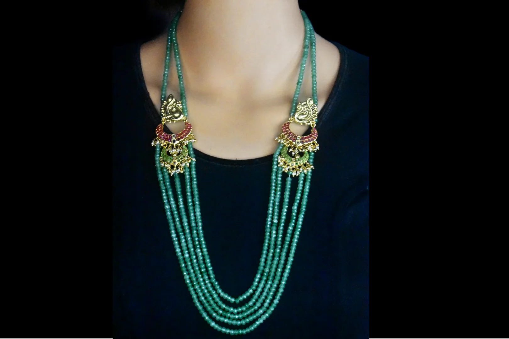 Multi Strand Emerald Beads Necklace With Peacock Side Pendants

By Asp Fashion Jewellery